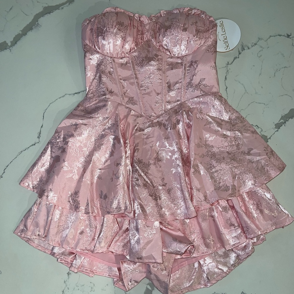 Brand new with tags selfie Leslie romper.